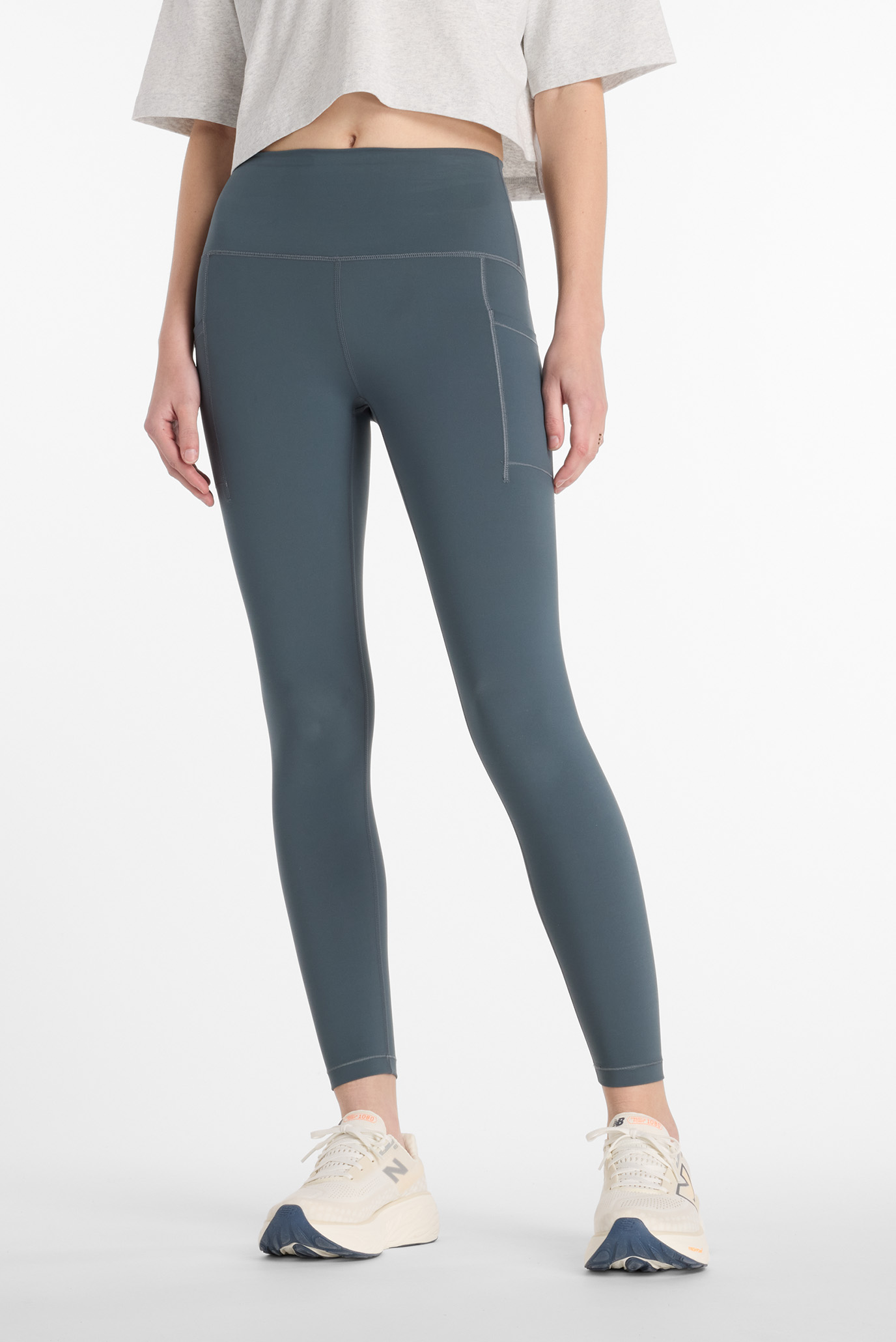 Женские серые тайтсы NB Sleek Pocket High Rise Legging 25" Серый L New Balance WP51268GT Женские серые тайтсы NB Sleek Pocket High Rise Legging 25" Серый L New Balance WP51268GT