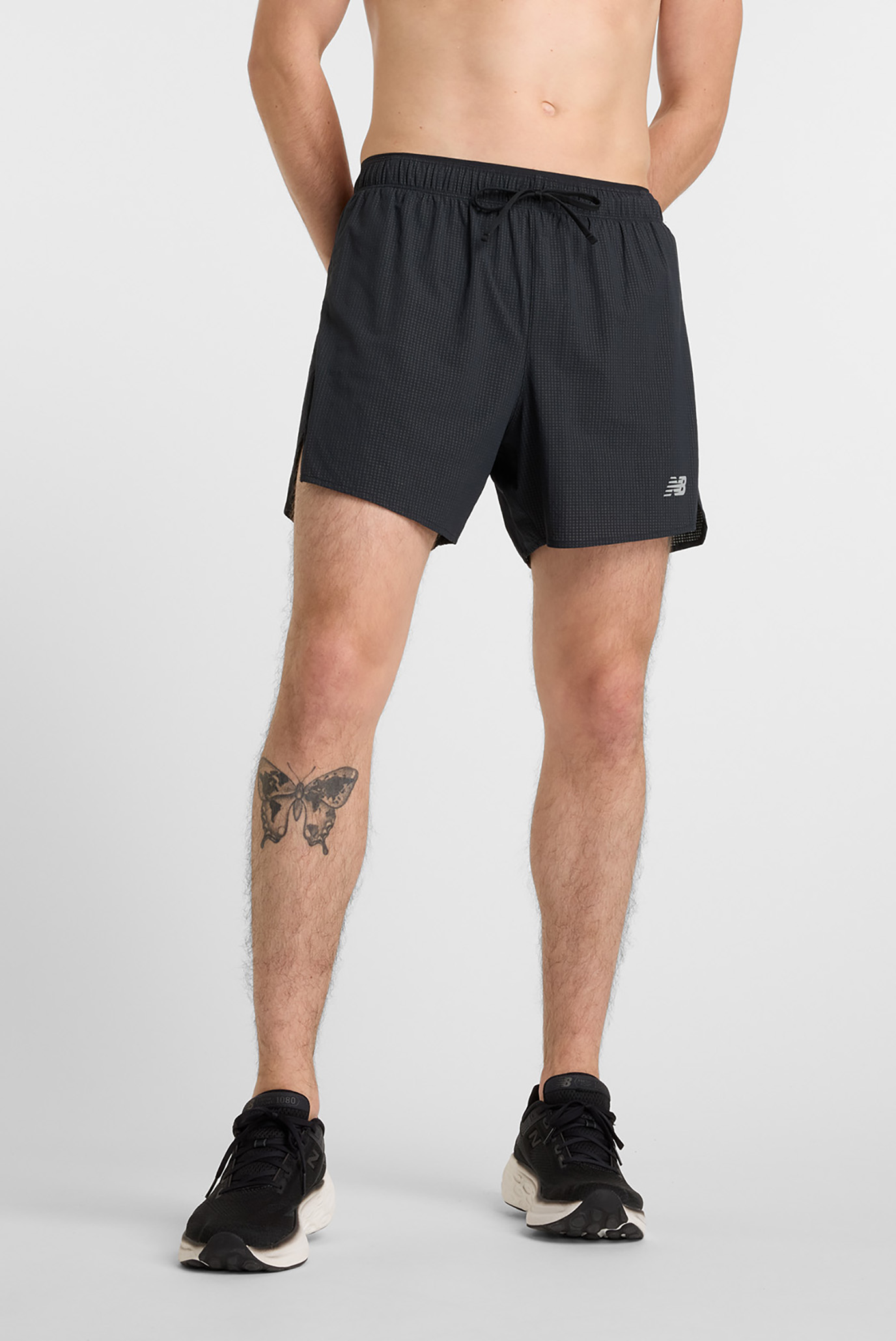 Мужские черные шорты RC Ultra Light Split Short 5" Черный S New Balance MS51286BK Мужские черные шорты RC Ultra Light Split Short 5" Черный S New Balance MS51286BK