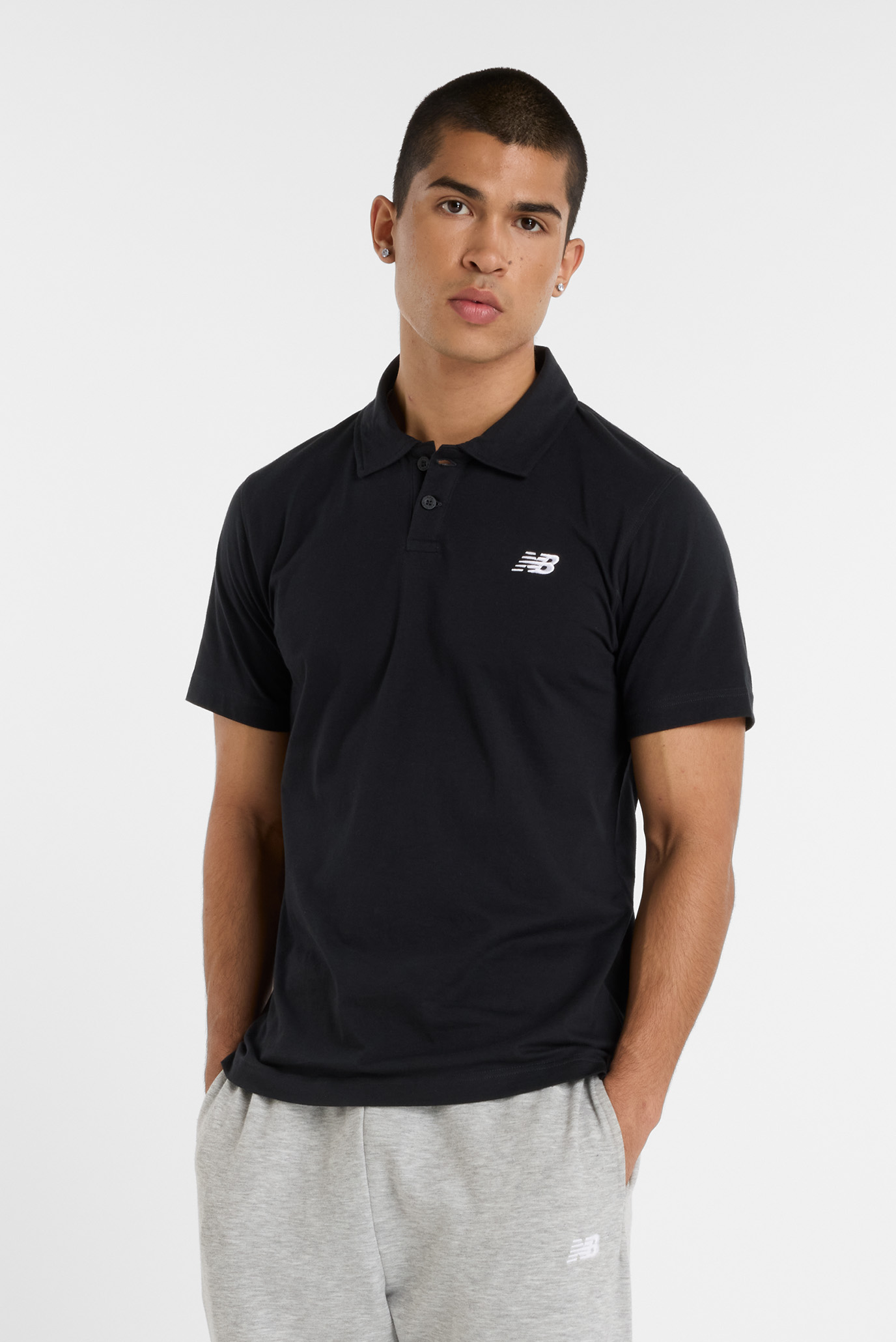 Мужская черная футболка Jersey Polo Черный L New Balance MT51504BK Мужская черная футболка Jersey Polo Черный L New Balance MT51504BK