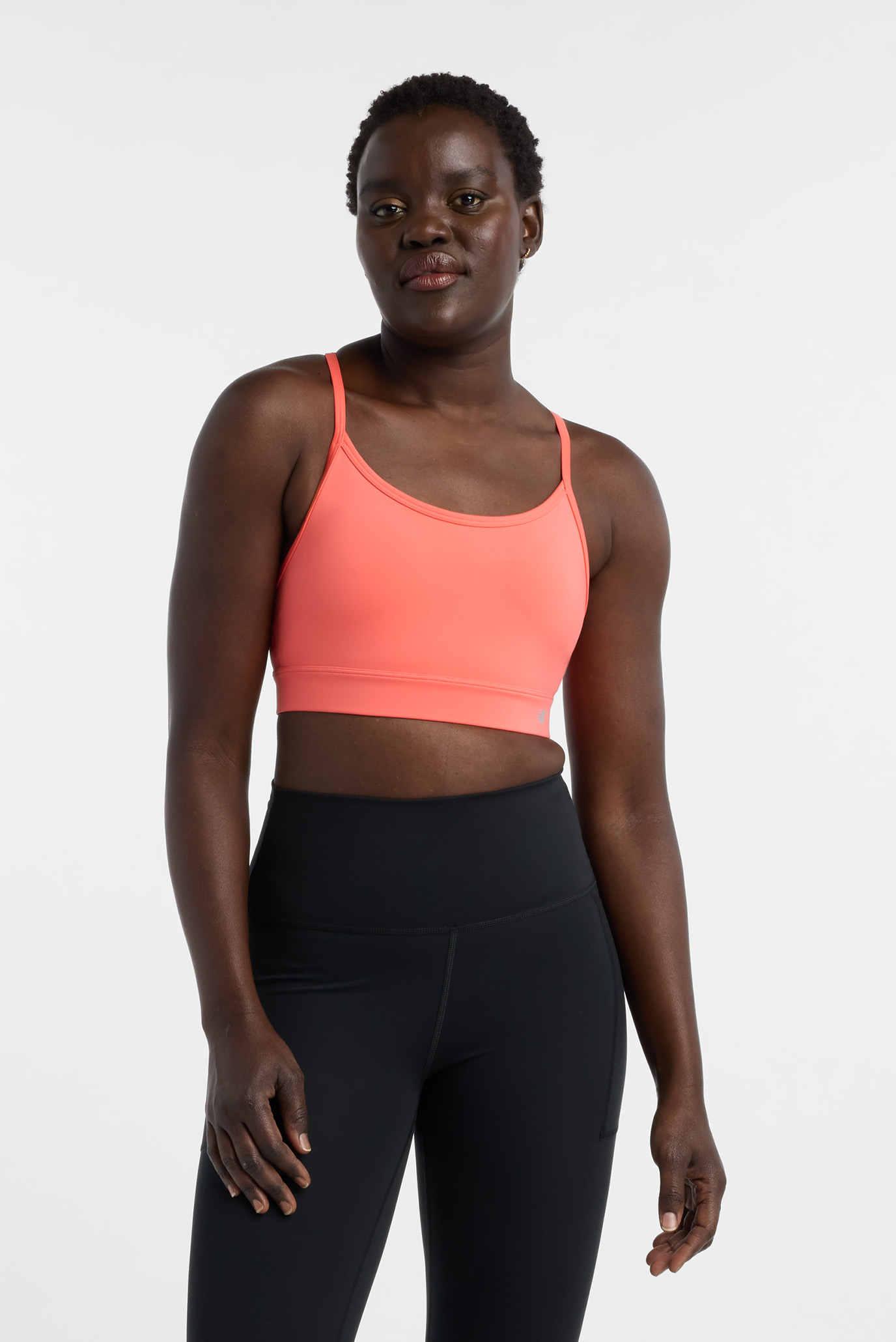 Женский коралловый топ NB Essential Yoga Коралловый 44 New Balance WB51039DTR Женский коралловый топ NB Essential Yoga Коралловый 44 New Balance WB51039DTR
