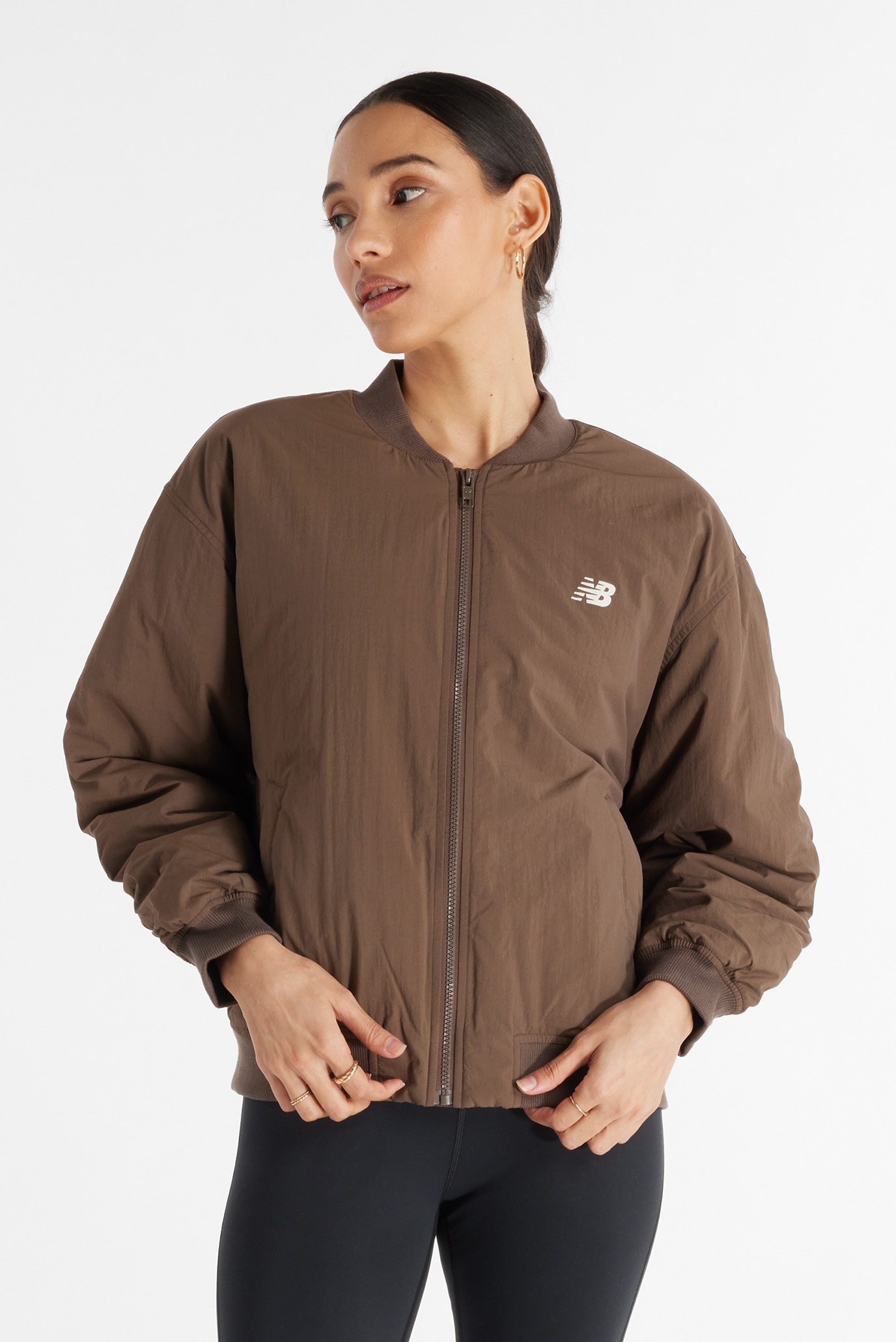Женский коричневый бомбер Graphic Woven Bomber Коричневый XS New Balance WJ43511DUO Женский коричневый бомбер Graphic Woven Bomber Коричневый XS New Balance WJ43511DUO