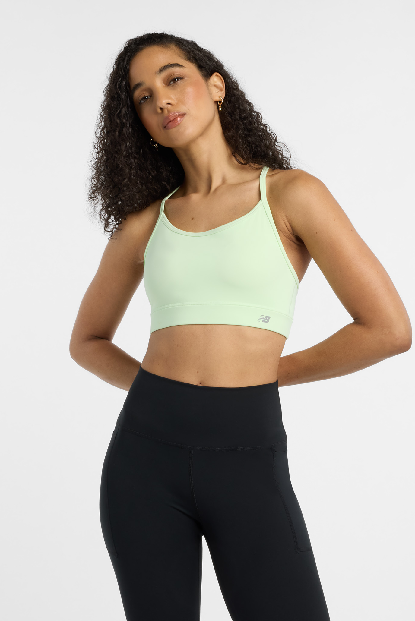 Женский салатовый топ Essential Train Bra Салатовый 44 New Balance WB51039MEW Женский салатовый топ Essential Train Bra Салатовый 44 New Balance WB51039MEW