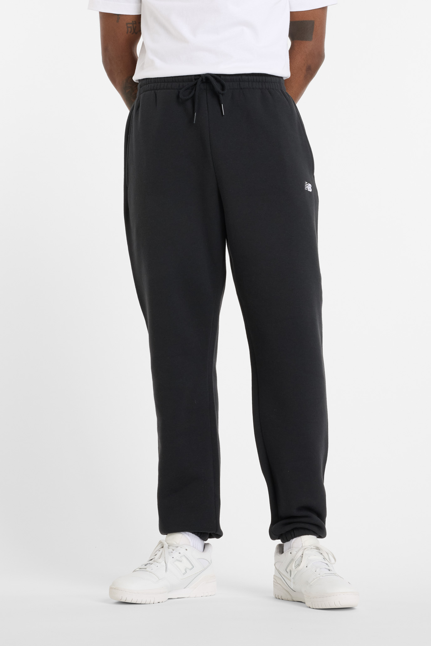 Мужские черные спортивные брюки Sport Essentials Fleece Черный S New Balance MP41503BK Мужские черные спортивные брюки Sport Essentials Fleece Черный S New Balance MP41503BK