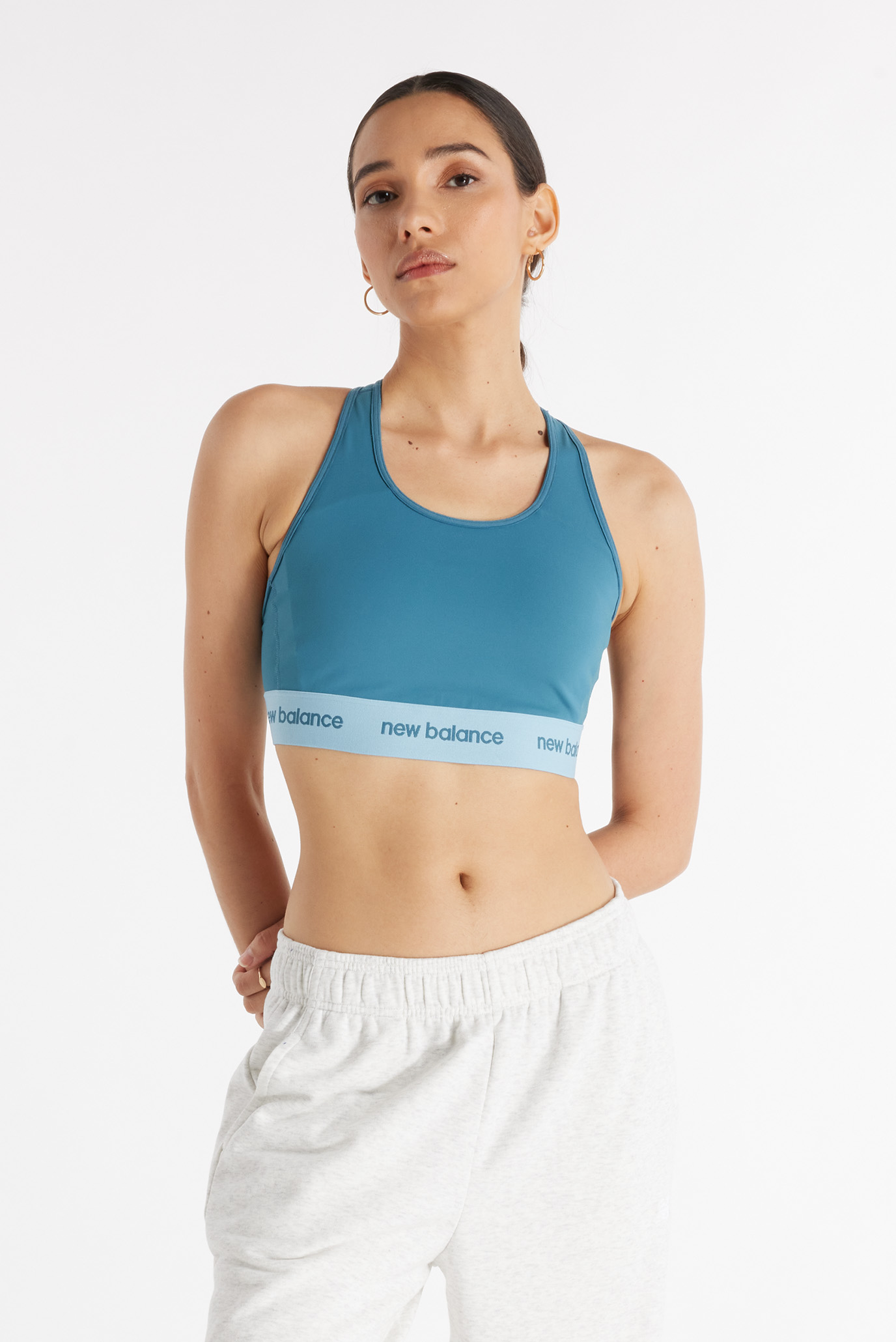 Женский голубой топ Sleek Support Pocket Голубой 44 New Balance WB41048TEI Женский голубой топ Sleek Support Pocket Голубой 44 New Balance WB41048TEI