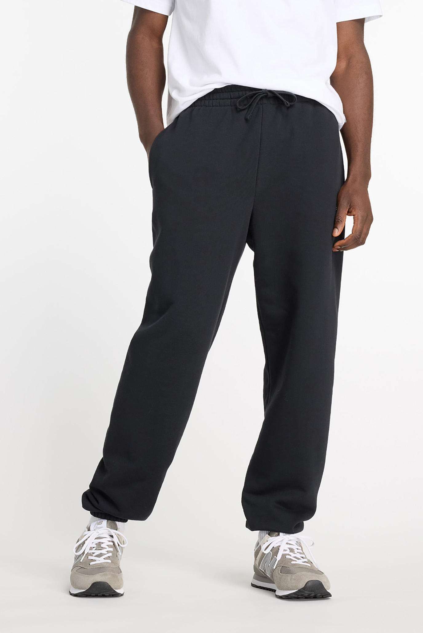 Мужские черные спортивные брюки NB Small Logo Черный XXL New Balance MP41519BK Мужские черные спортивные брюки NB Small Logo Черный XXL New Balance MP41519BK