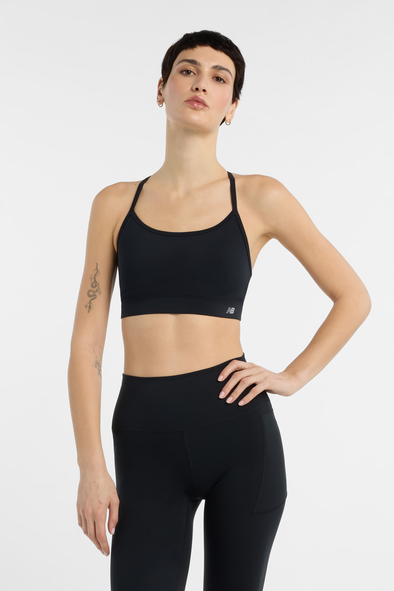 Женский черный топ NB Essential Yoga Черный M New Balance WB51039BK Женский черный топ NB Essential Yoga Черный M New Balance WB51039BK