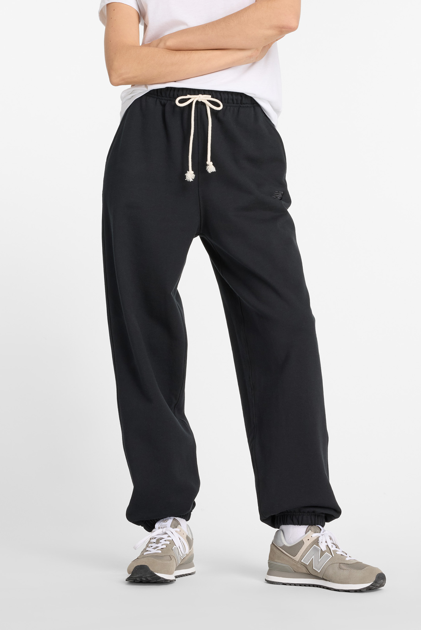 Женские черные брюки NB Athletics Черный S New Balance WP41513BK Женские черные брюки NB Athletics Черный S New Balance WP41513BK