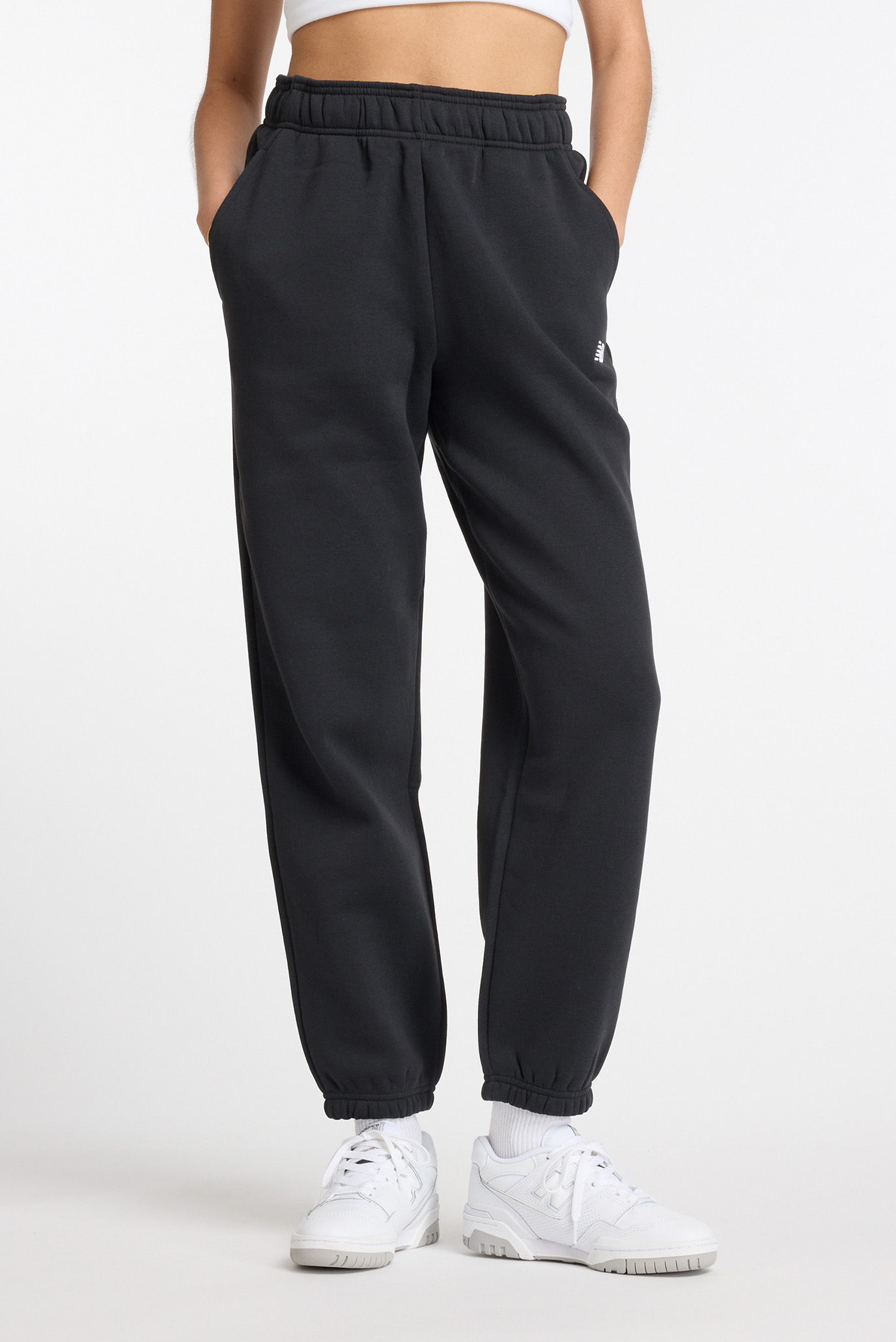 Женские черные спортивные брюки Essentials Fleece Черный M New Balance WP41502BK Женские черные спортивные брюки Essentials Fleece Черный M New Balance WP41502BK