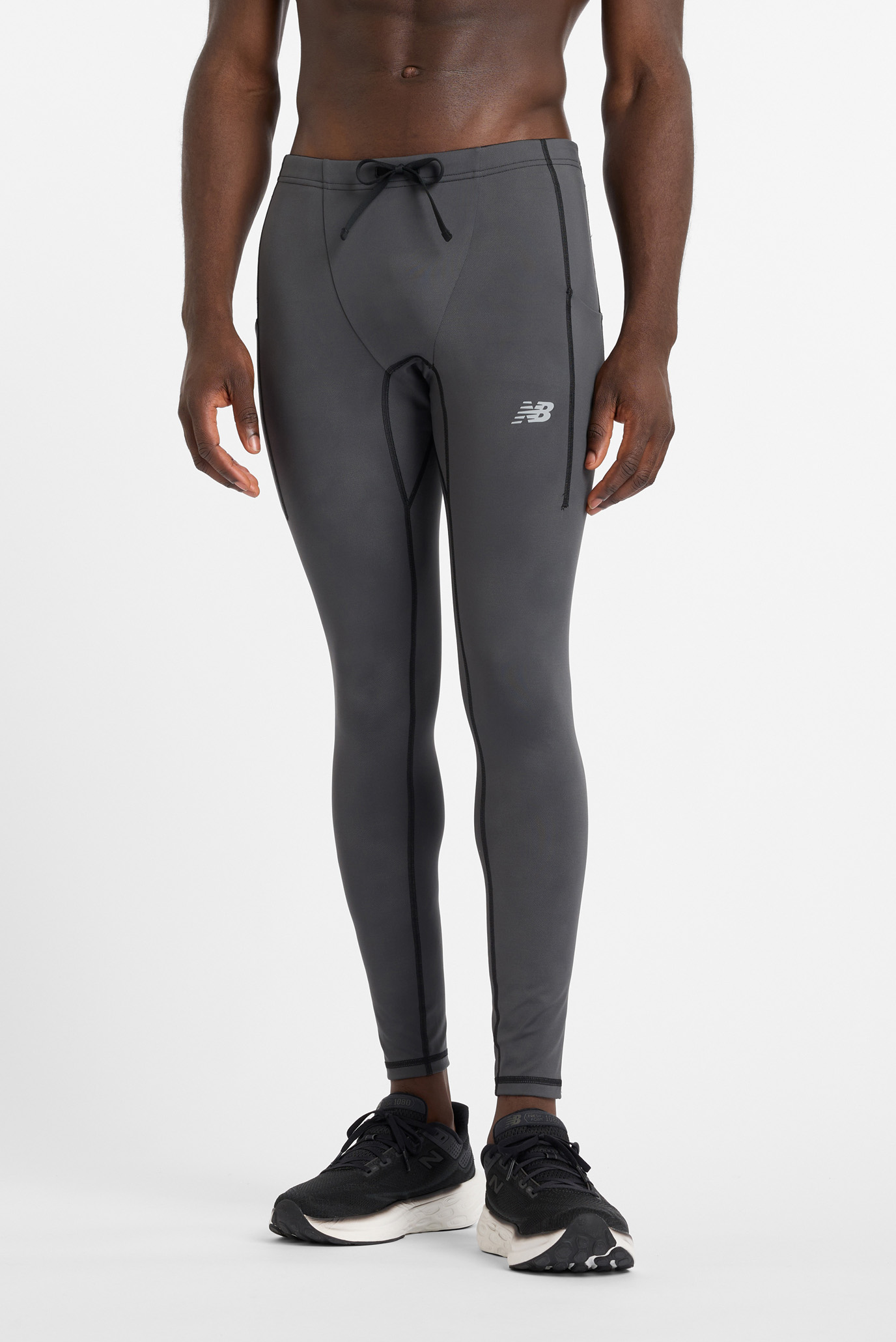 Мужские черные тайтсы Reflective Heat Черный M New Balance MP43258BM Мужские черные тайтсы Reflective Heat Черный M New Balance MP43258BM