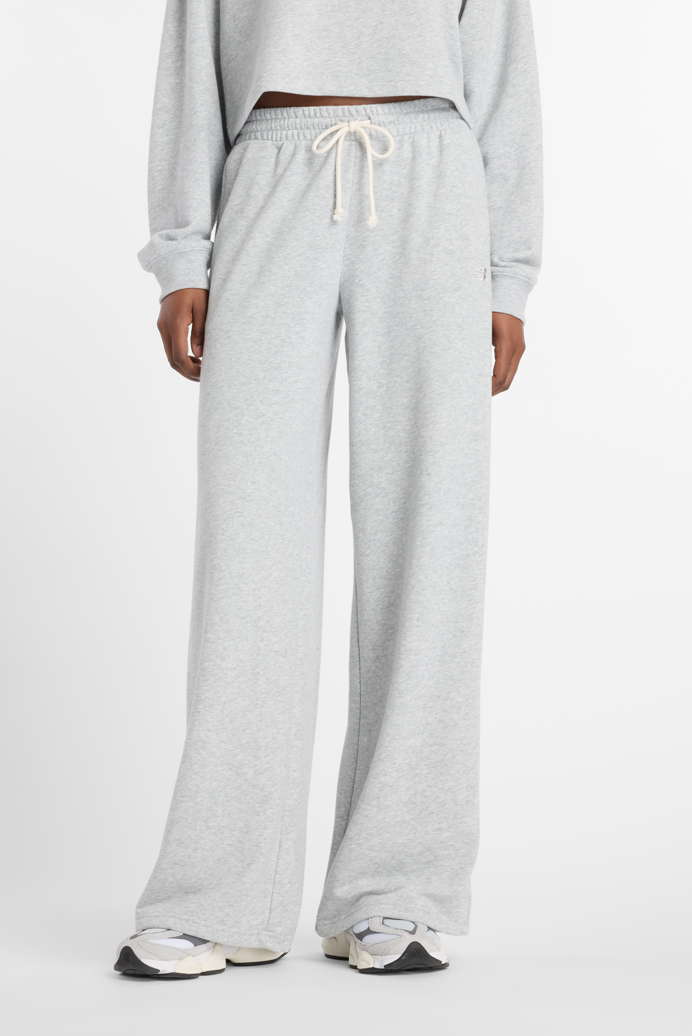 Женские серые брюки Coastal Fleece Серый XL New Balance WP51503AGT Женские серые брюки Coastal Fleece Серый XL New Balance WP51503AGT