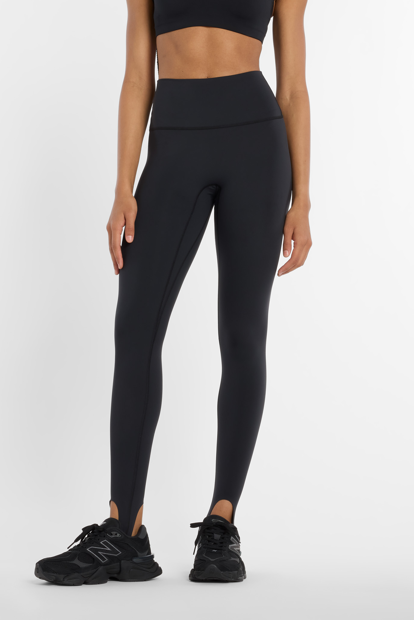 Женские черные тайтсы NB Sleek Stirrup Черный L New Balance WP53168BK Женские черные тайтсы NB Sleek Stirrup Черный L New Balance WP53168BK