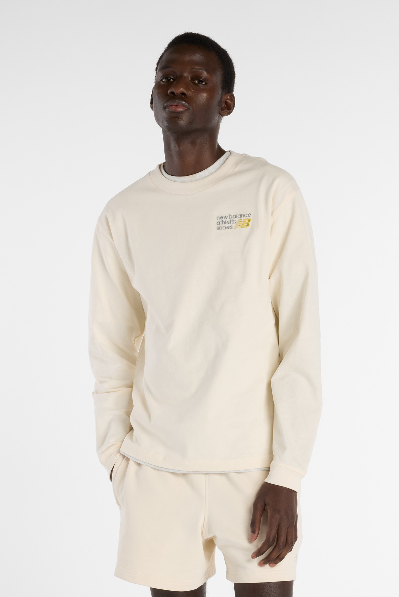 Мужской бежевый лонгслив Athletics Premium Back Logo Long Sleeve Бежевый S New Balance MT51931PEF Мужской бежевый лонгслив Athletics Premium Back Logo Long Sleeve Бежевый S New Balance MT51931PEF