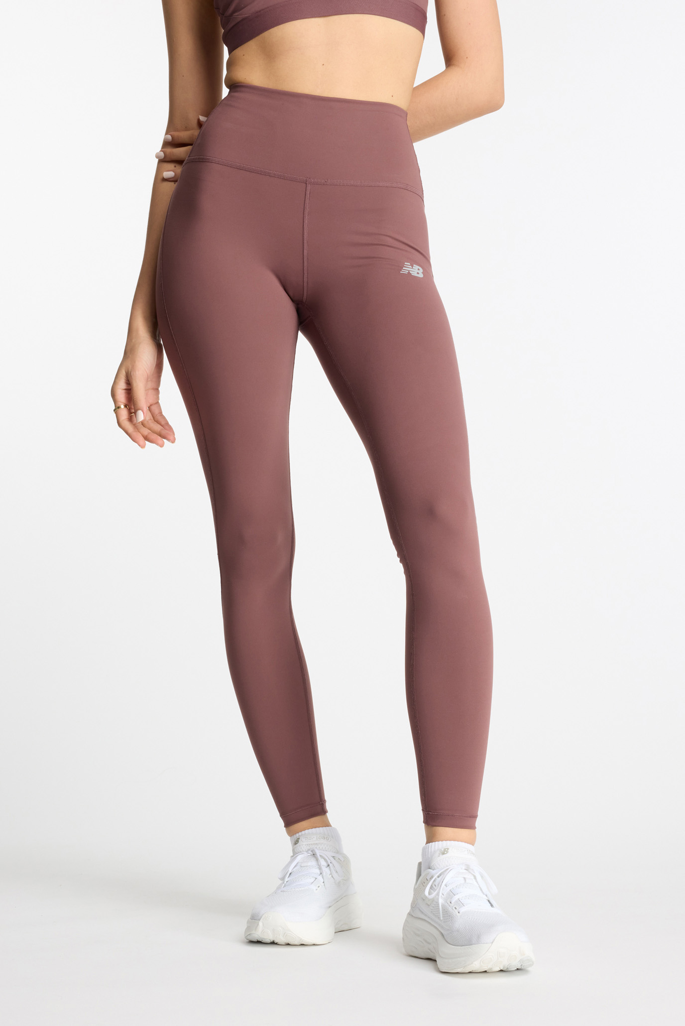 Женские коричневые тайтсы NB Sleek 27 Inch Коричневый 44 New Balance WP41237LIE Женские коричневые тайтсы NB Sleek 27 Inch Коричневый 44 New Balance WP41237LIE