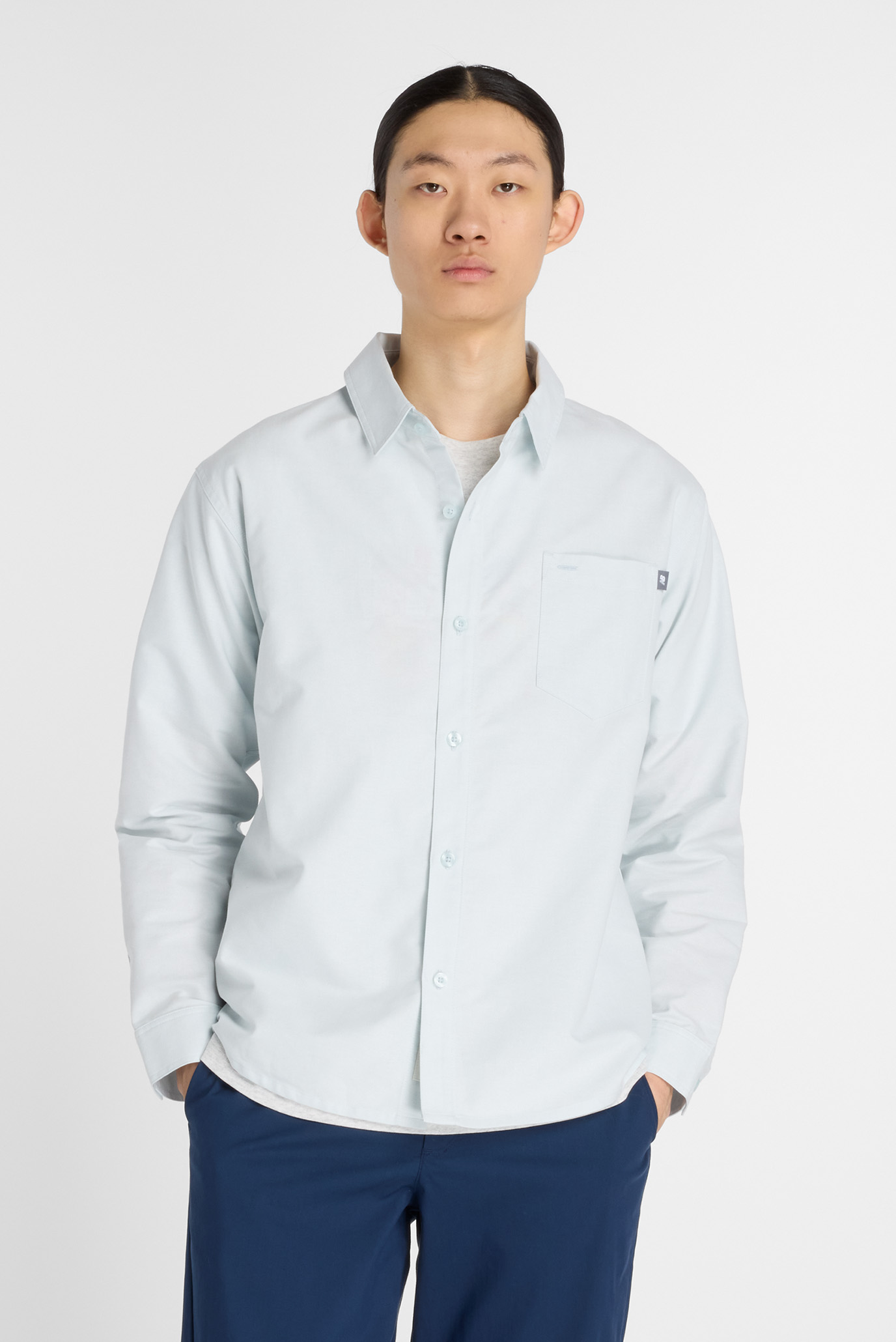 Мужская голубая рубашка Oxford Голубой S New Balance MT53523FRL Мужская голубая рубашка Oxford Голубой S New Balance MT53523FRL