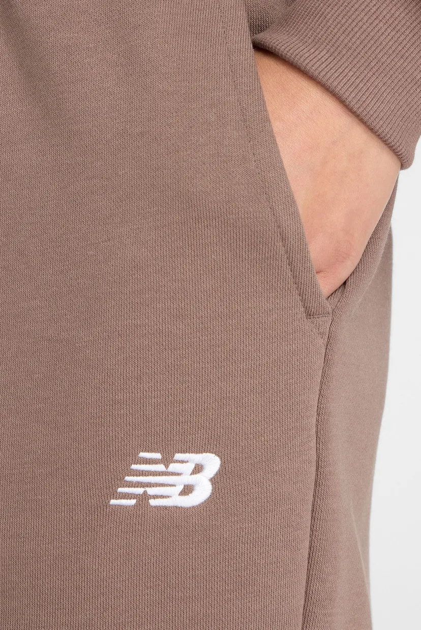 Жіночі коричневі спортивні штани Sport Essentials French Terry Jogger 4