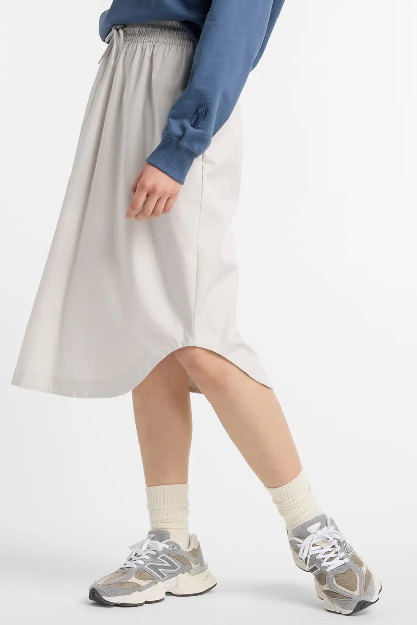 Жіноча сіра спідниця Twill Midi New Balance WK51551GYM — MD-Fashion