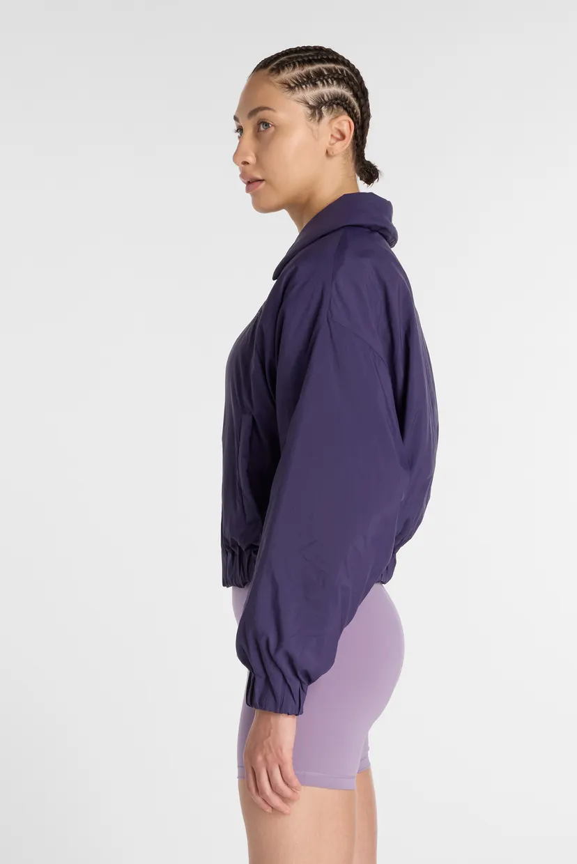 Женская фиолетовая куртка Woven Bomber Jacket New Balance