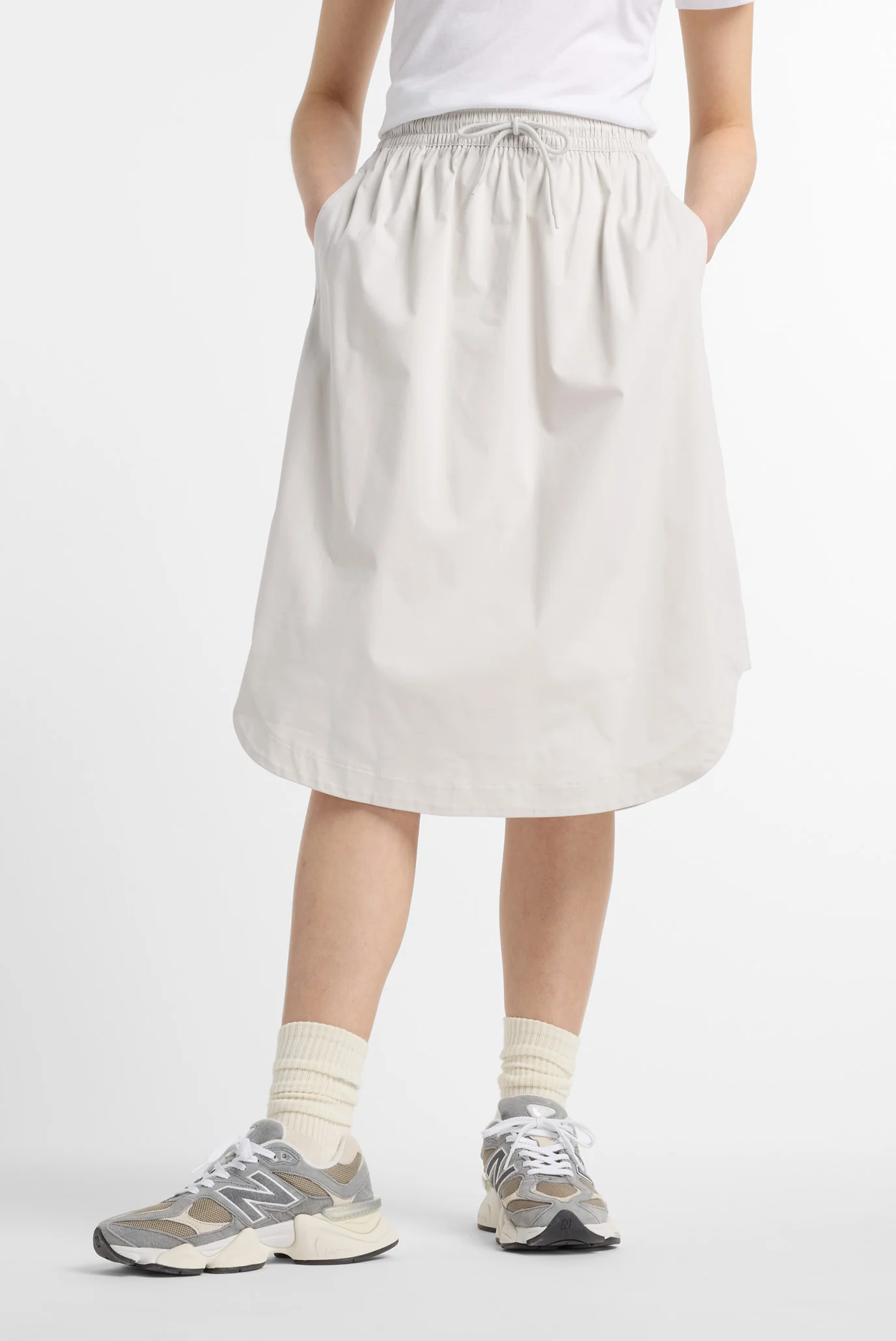 Женская серая юбка Twill Midi New Balance WK51551GYM — MD-Fashion