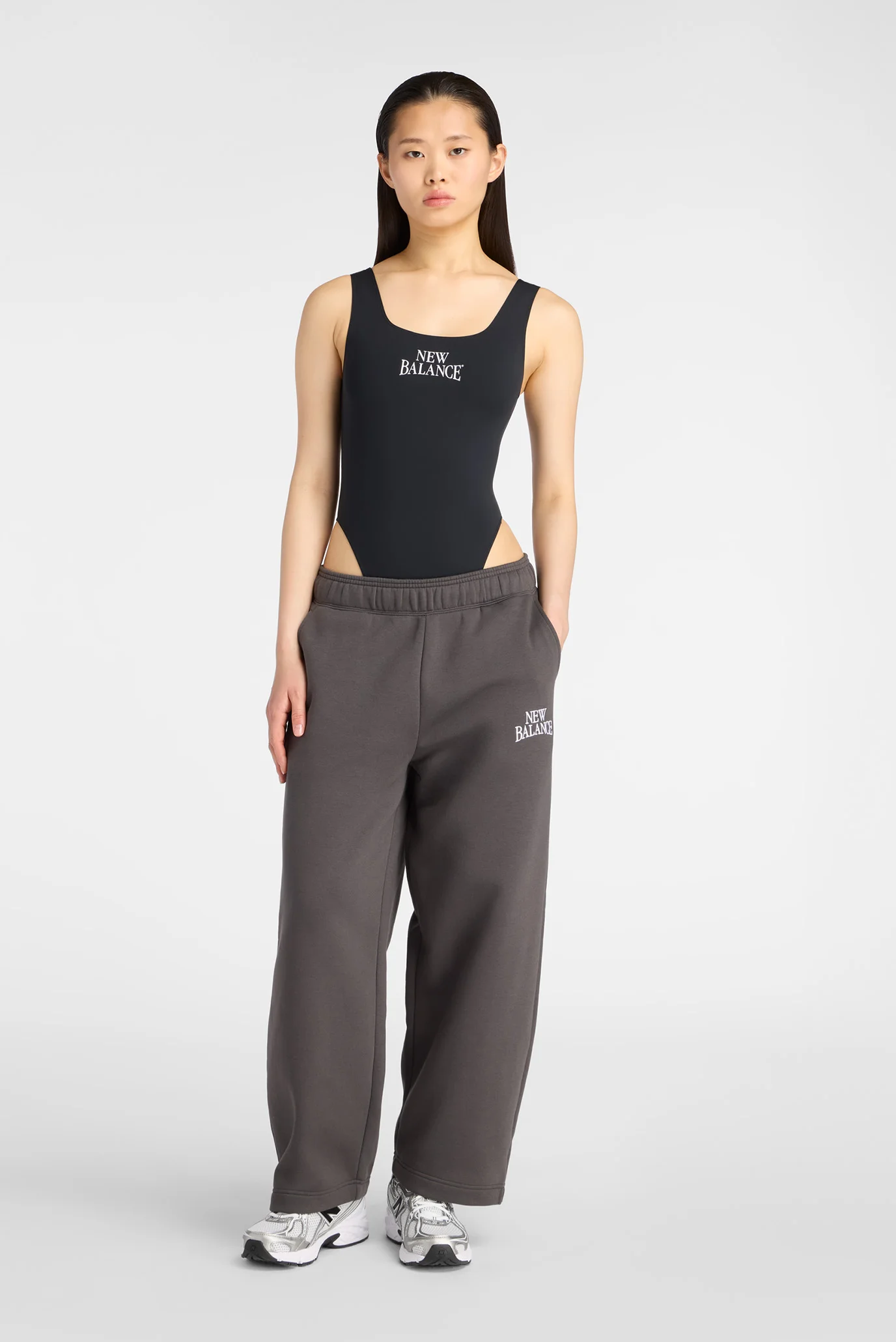 Жіноче чорне боді Trackside Bodysuit New Balance WS61T61OBK — MD