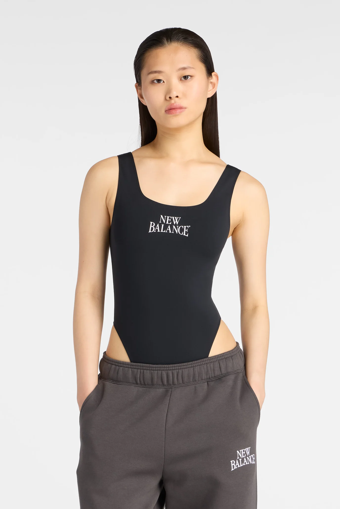 Жіноче чорне боді Trackside Bodysuit New Balance WS61T61OBK — MD