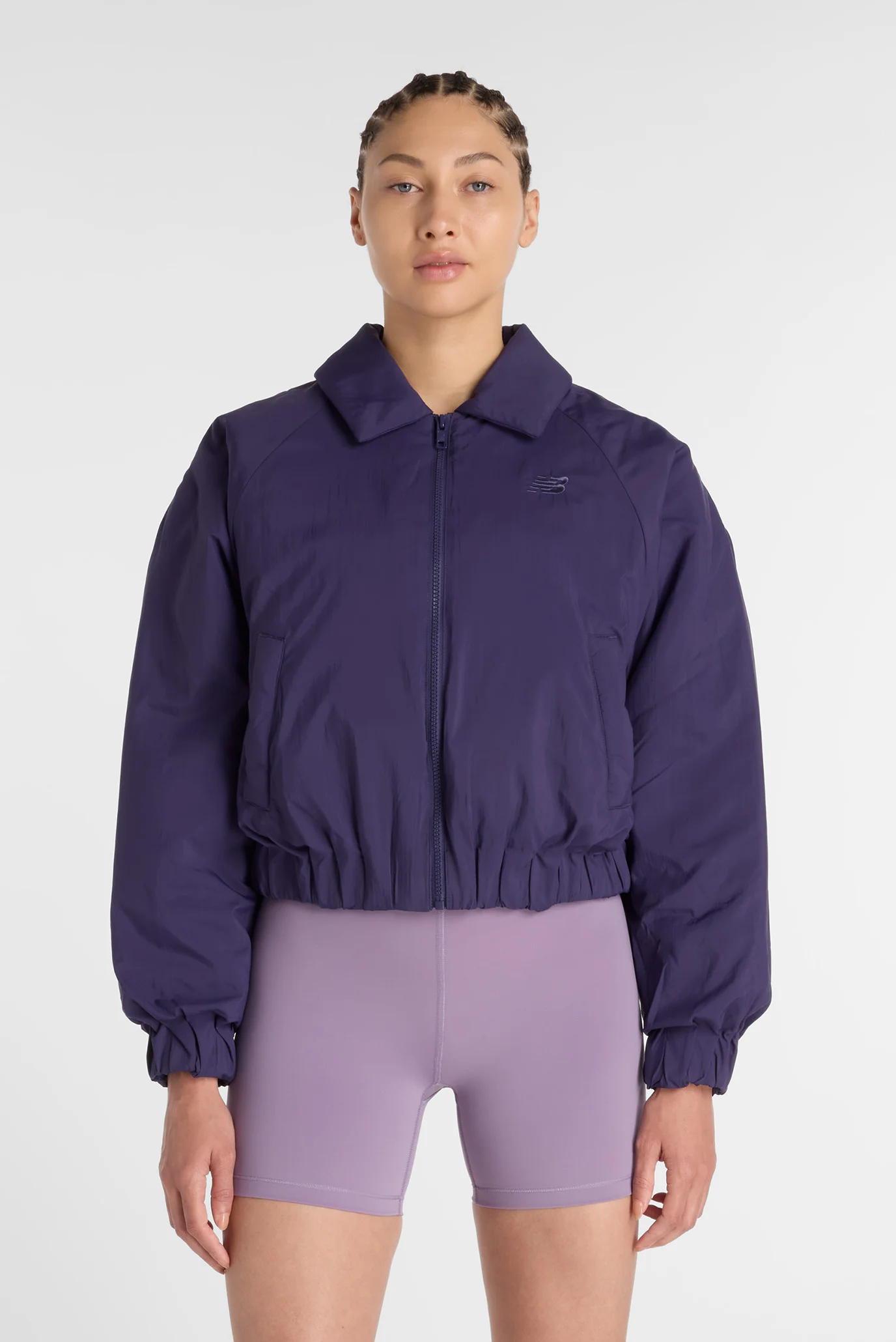 Женская фиолетовая куртка Woven Bomber Jacket New Balance